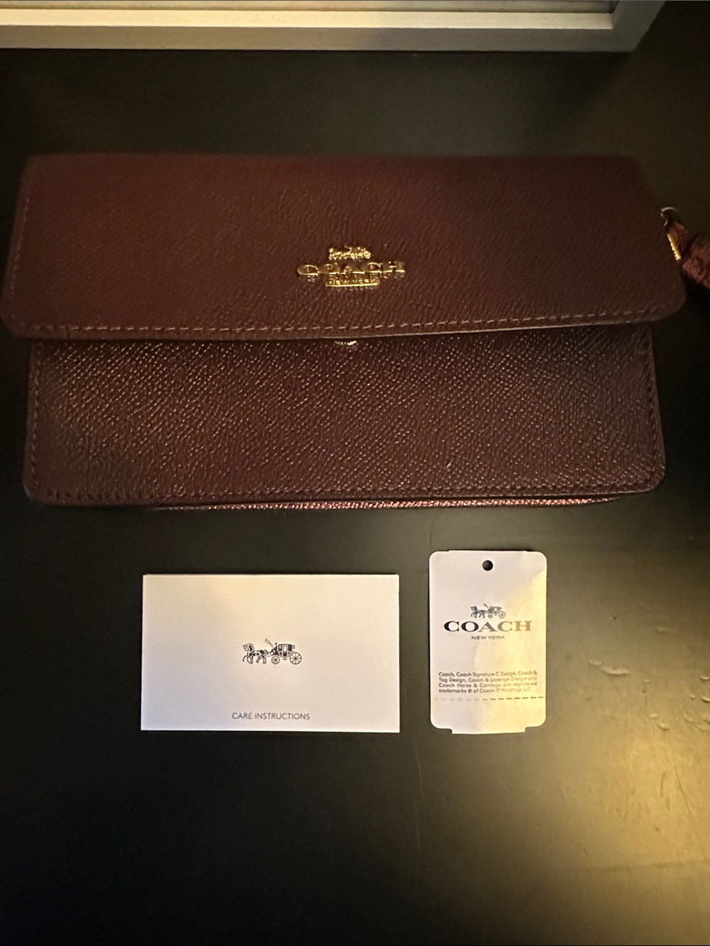 Coach Pebbled Leather Wristlet in Deep Plum with Gold Logo - Picture 2 of 6